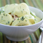 Delicious creamy German potato salad dressed in mayo infused with mustard and parsley.